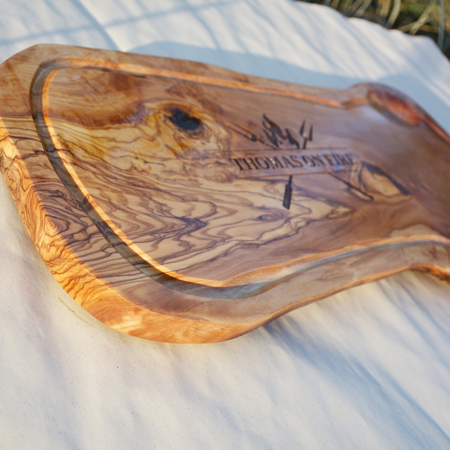 ON FIRE - personalized engraving on an olive wood board