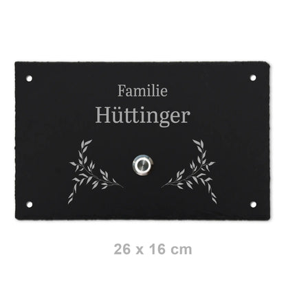 Personalisiertes Klingelschild aus Schiefer Motiv Hüttinger mit Blätterzweig seitlich des Tasters